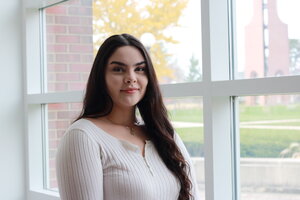 brunette girl in offwhite colored sweater