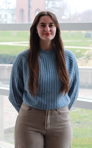 girl in light blue sweater