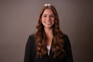 brunette girl in black blazer